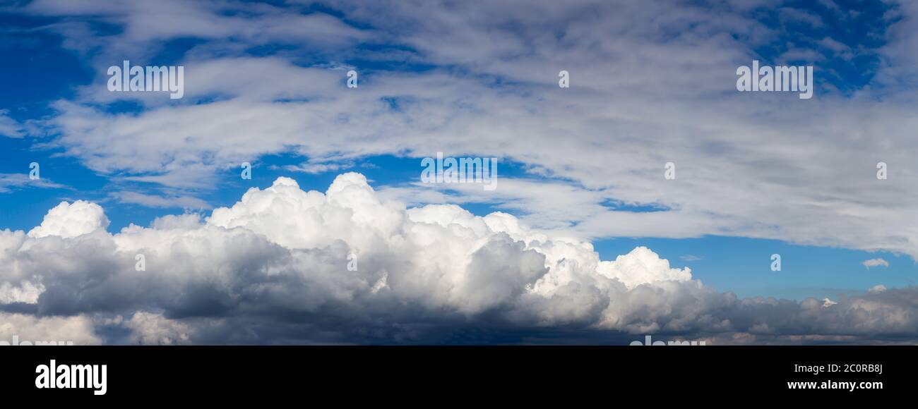 View of Puffy White Clouds with Blue Sky Stock Photo - Alamy