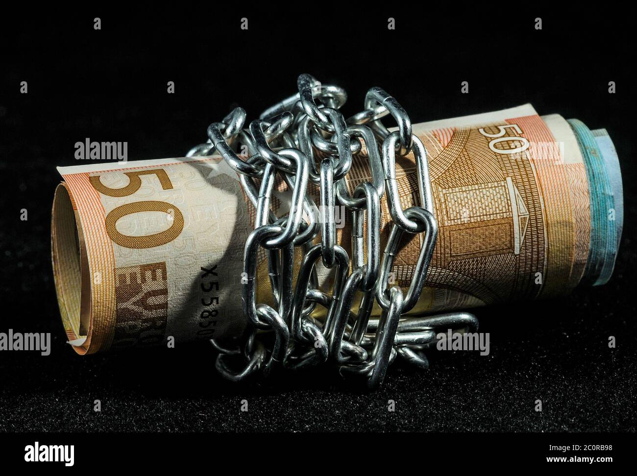 Money in chains Stock Photo