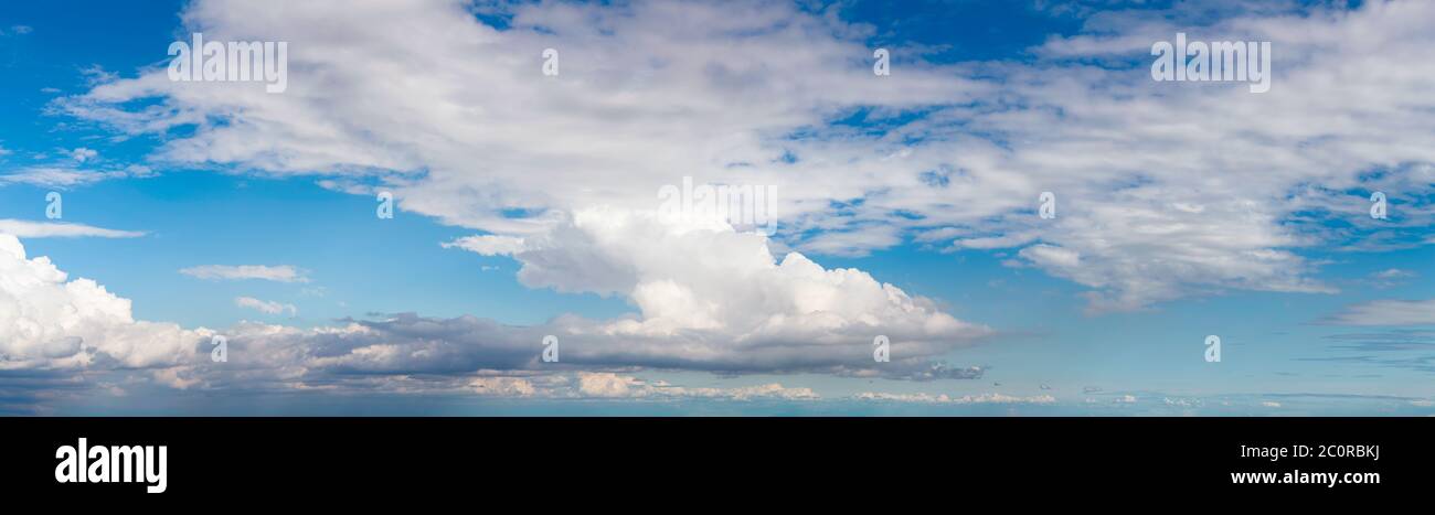 View of Puffy White Clouds with Blue Sky Stock Photo - Alamy