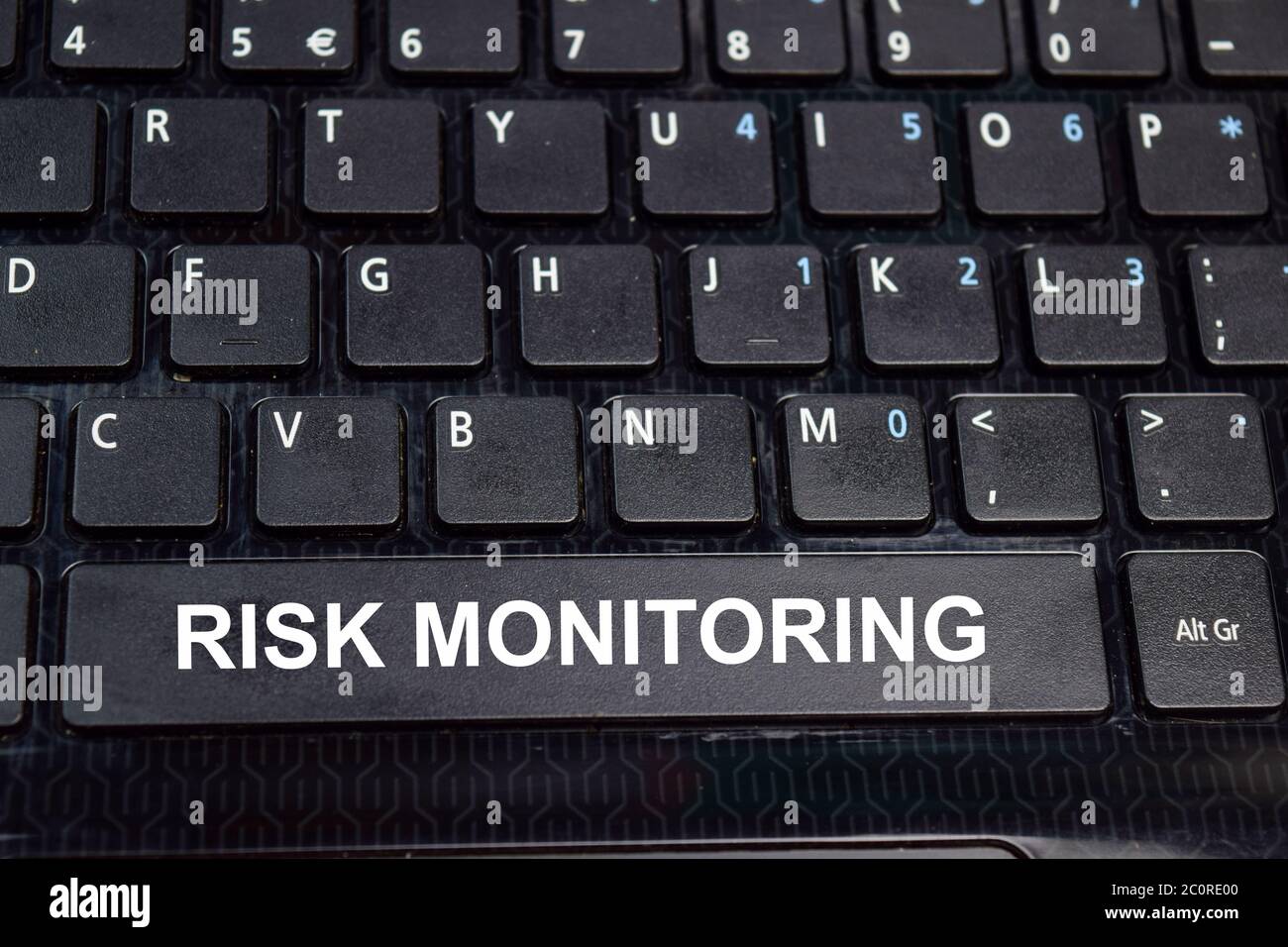 Risk Monitoring write on keyboard isolated on laptop background Stock ...