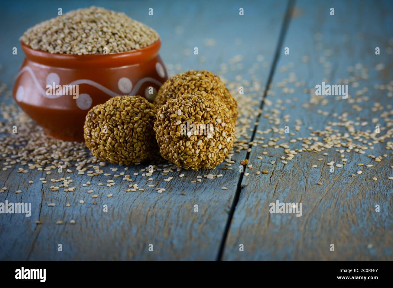 Sesame seeds and sesame laddu, Indian festival makar sankranti concept Stock Photo