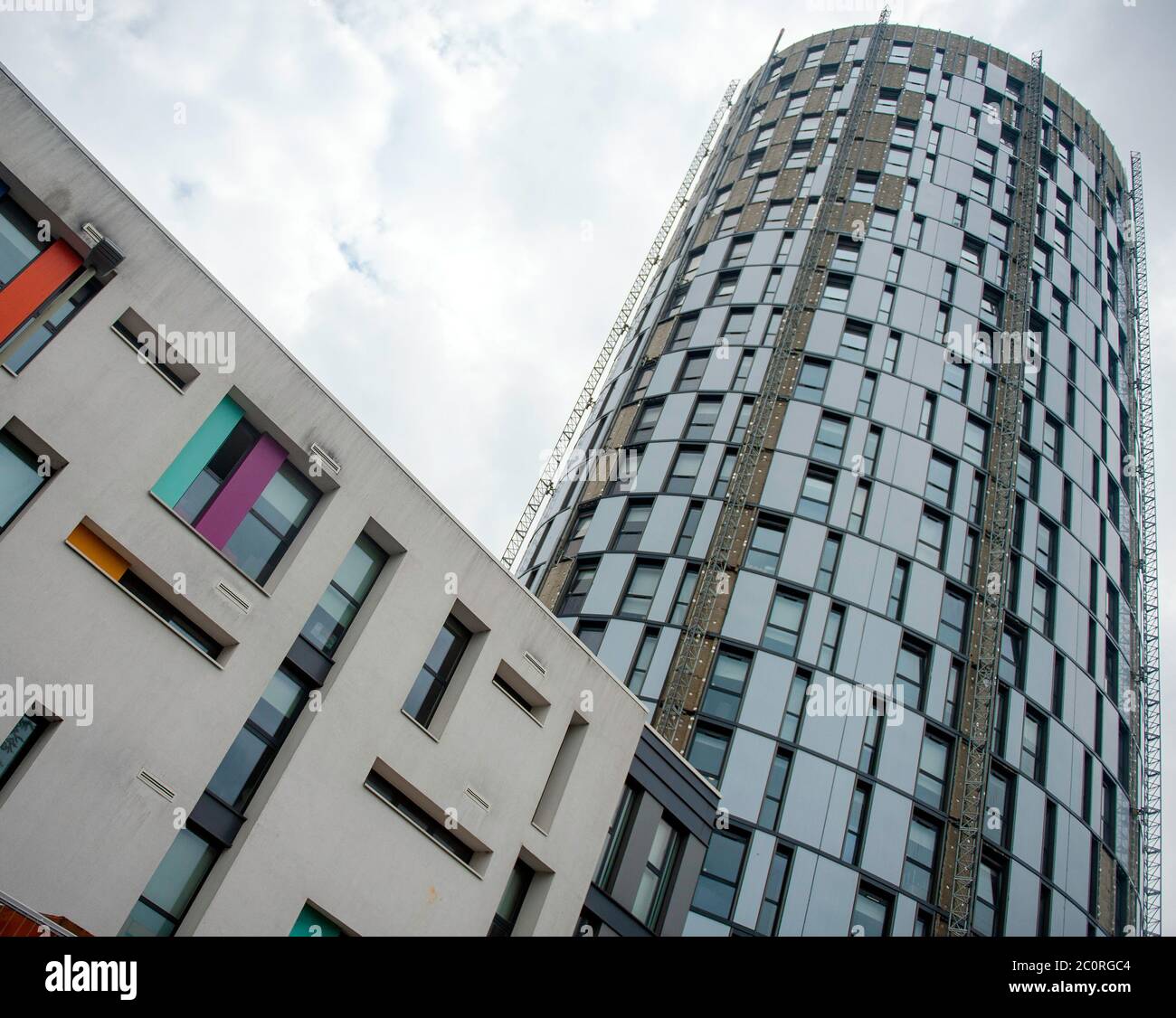 Grenfell style combustible cladding on The Student Roost building remains half removed as work is still required on the student accommodation skyrise block. Stock Photo