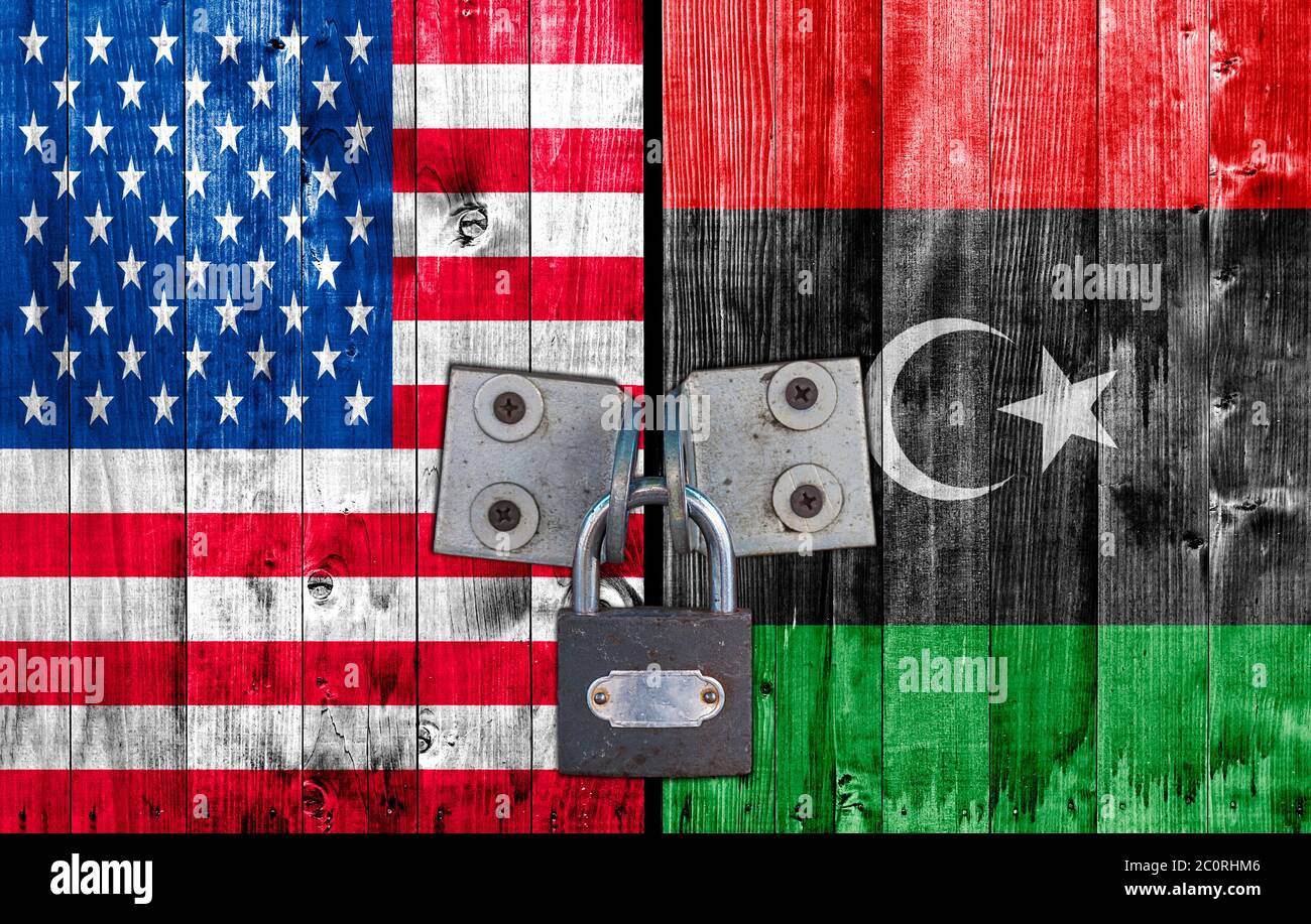 US and  Libya flag on door with padlock Stock Photo