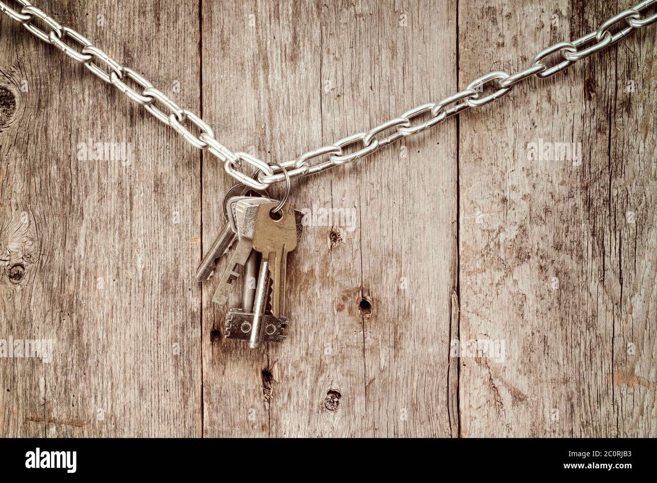 Bunch of keys hanging on chain Stock Photo Alamy