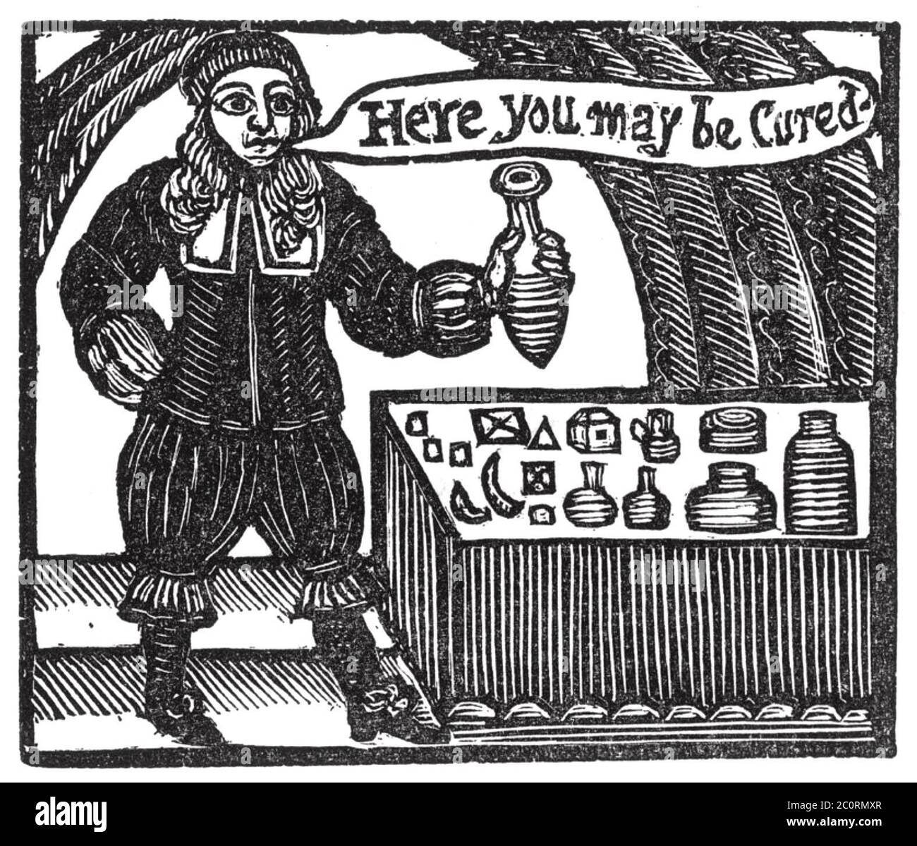 HERE YOU MAY BE CURED Quack medicine salesman in a17th century woodcut Stock Photo