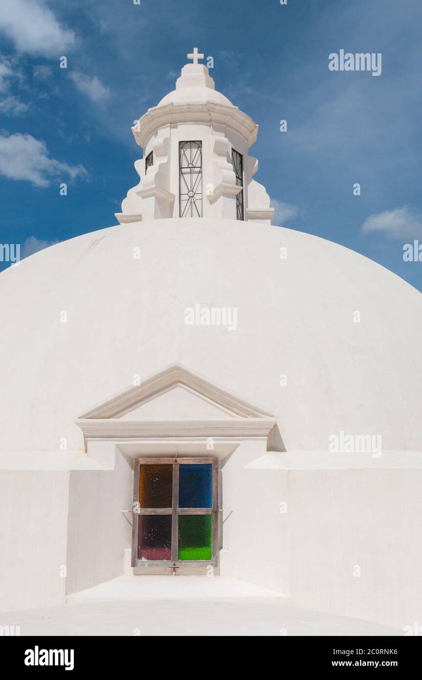 Round sphere rooftop on Top of a Church with colorful glass window Stock Photo