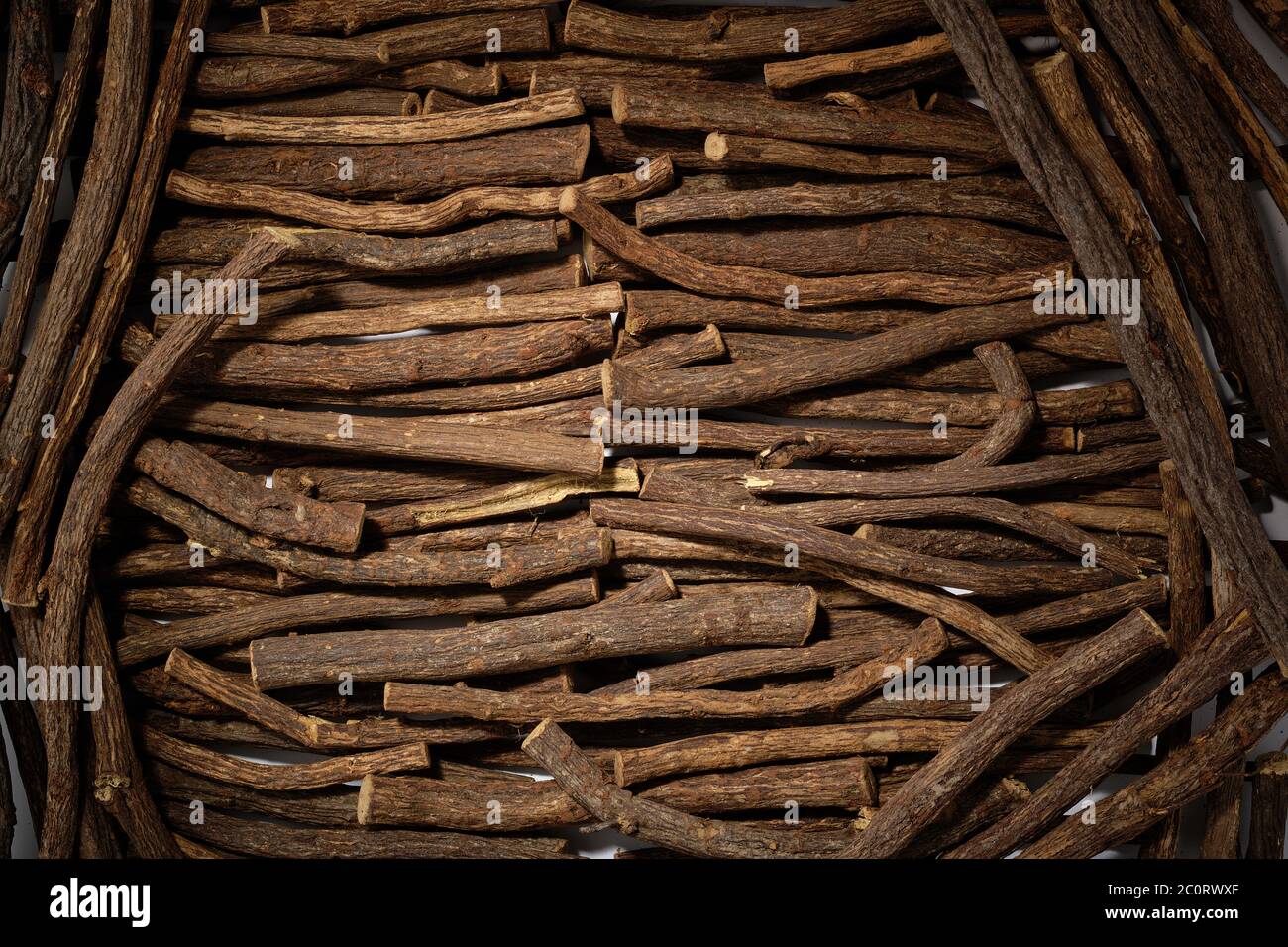 Liquorice sticks. Natural plant roots from which the sweet liquorice is extracted. Stock Photo