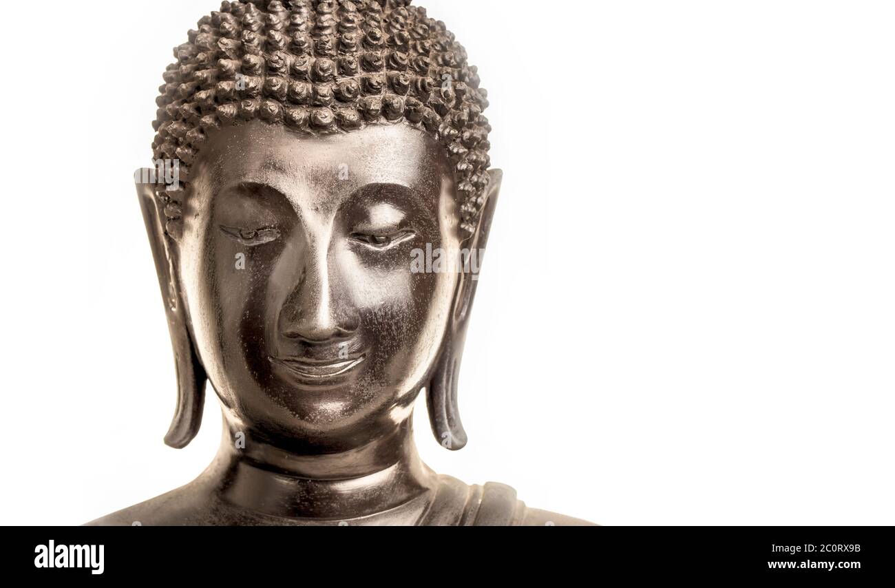 Black Buddha face on white background Stock Photo