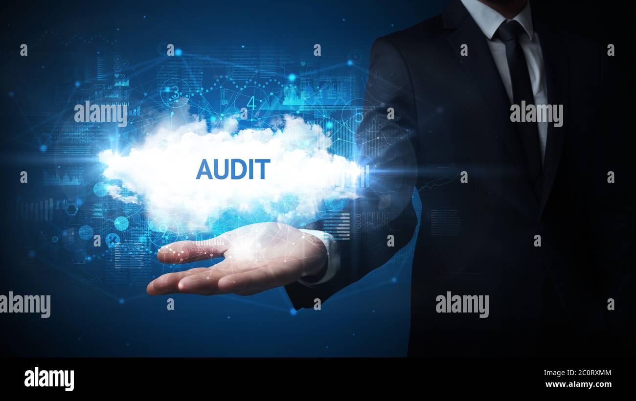 Hand of Businessman holding AUDIT inscription, successful business ...