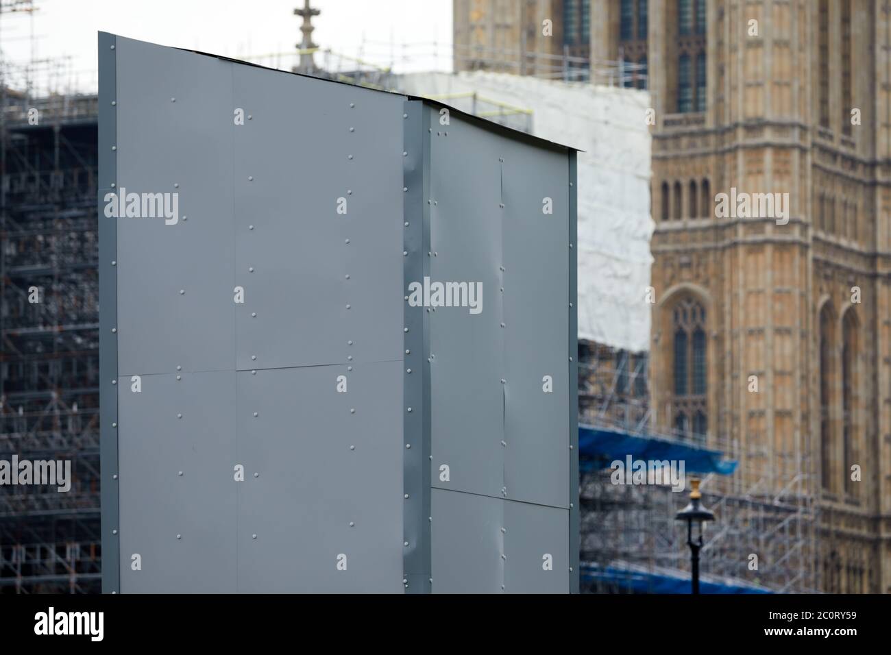 London, UK. - 12 Jun 2020: A box covers the statue of Winston Churchill outiside the Houses of Parliament following recent attacks on it during BlackLivesMatter protests. Stock Photo