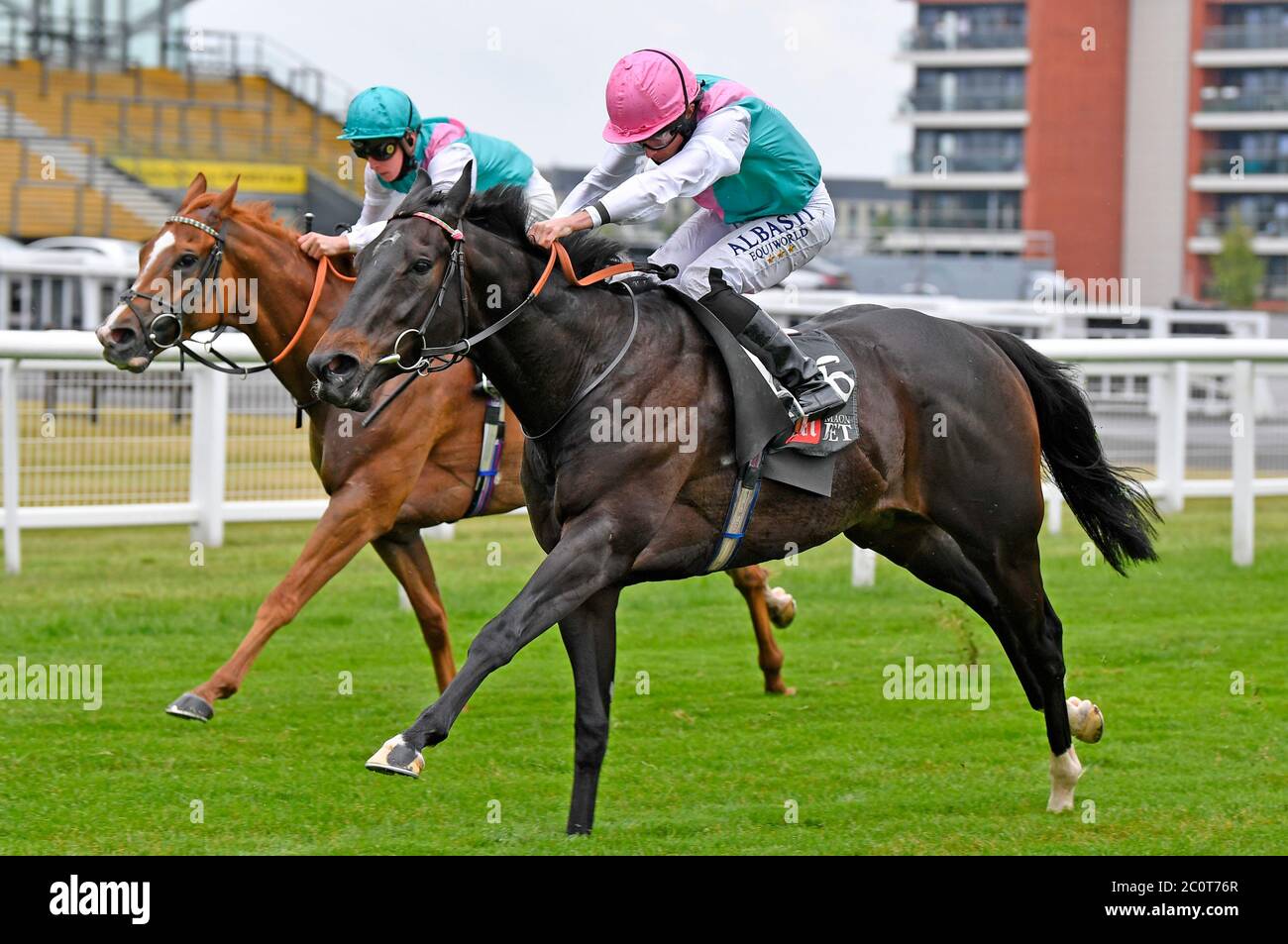 Breath Of Air ridden by Ryan Moore (right) wins the MansionBet’s Royal Ascot Special Handicap at Newbury Racecourse. Stock Photo