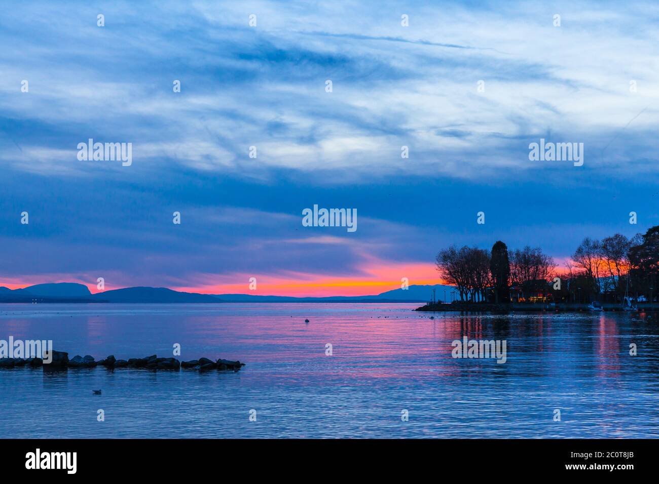 tunning view of lake Leman in Lausanne at dusk, Canton of Vaud, Switzerland Stock Photo