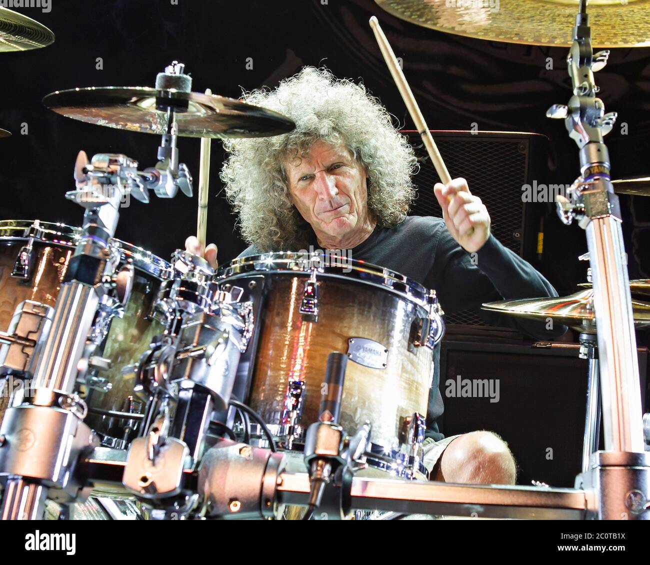 Whtiesnake drummer Tommy Aldridge performs with the rest of the band at