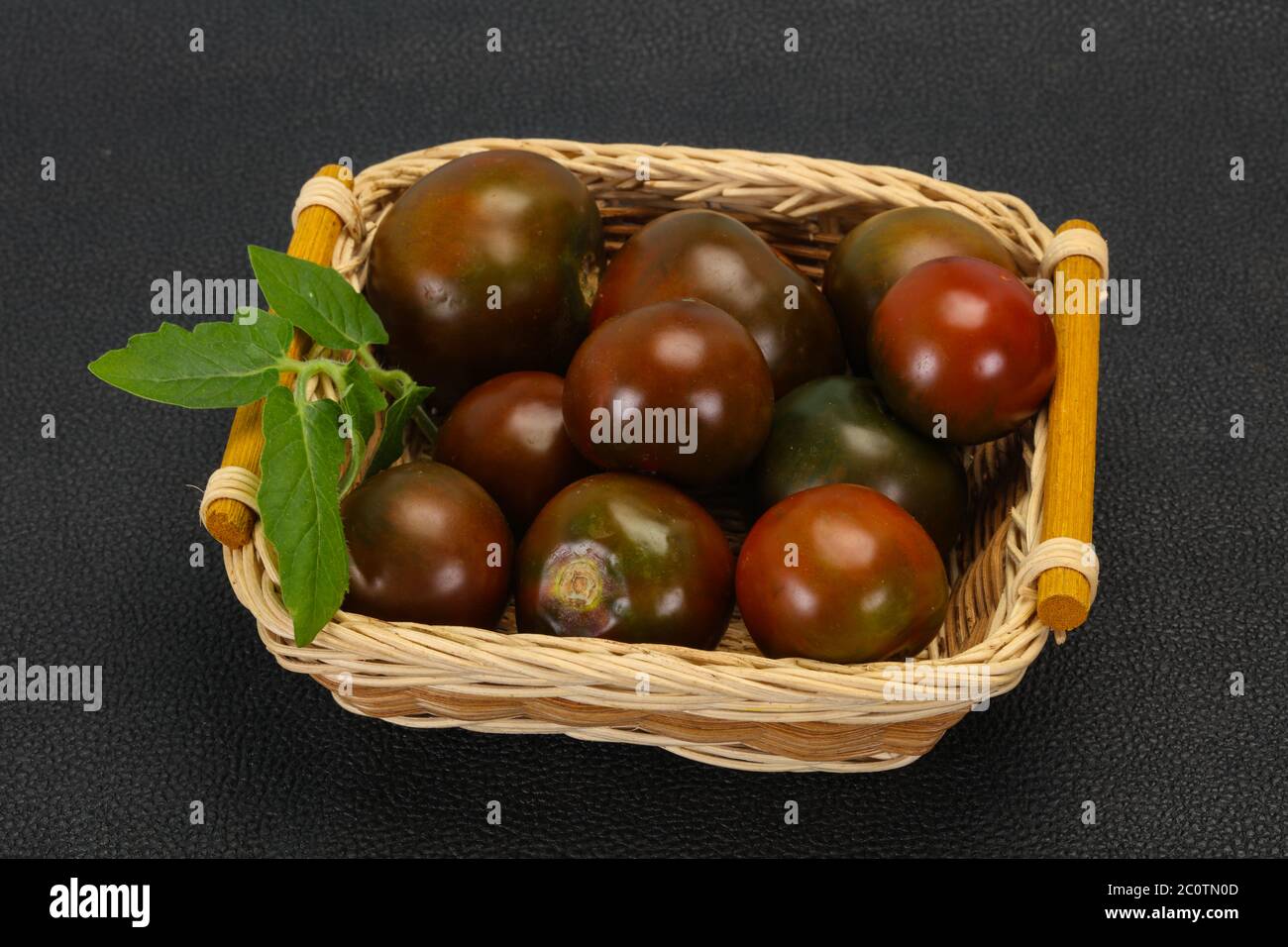 Black tomato tasty fresh ripe Kumato Stock Photo Alamy