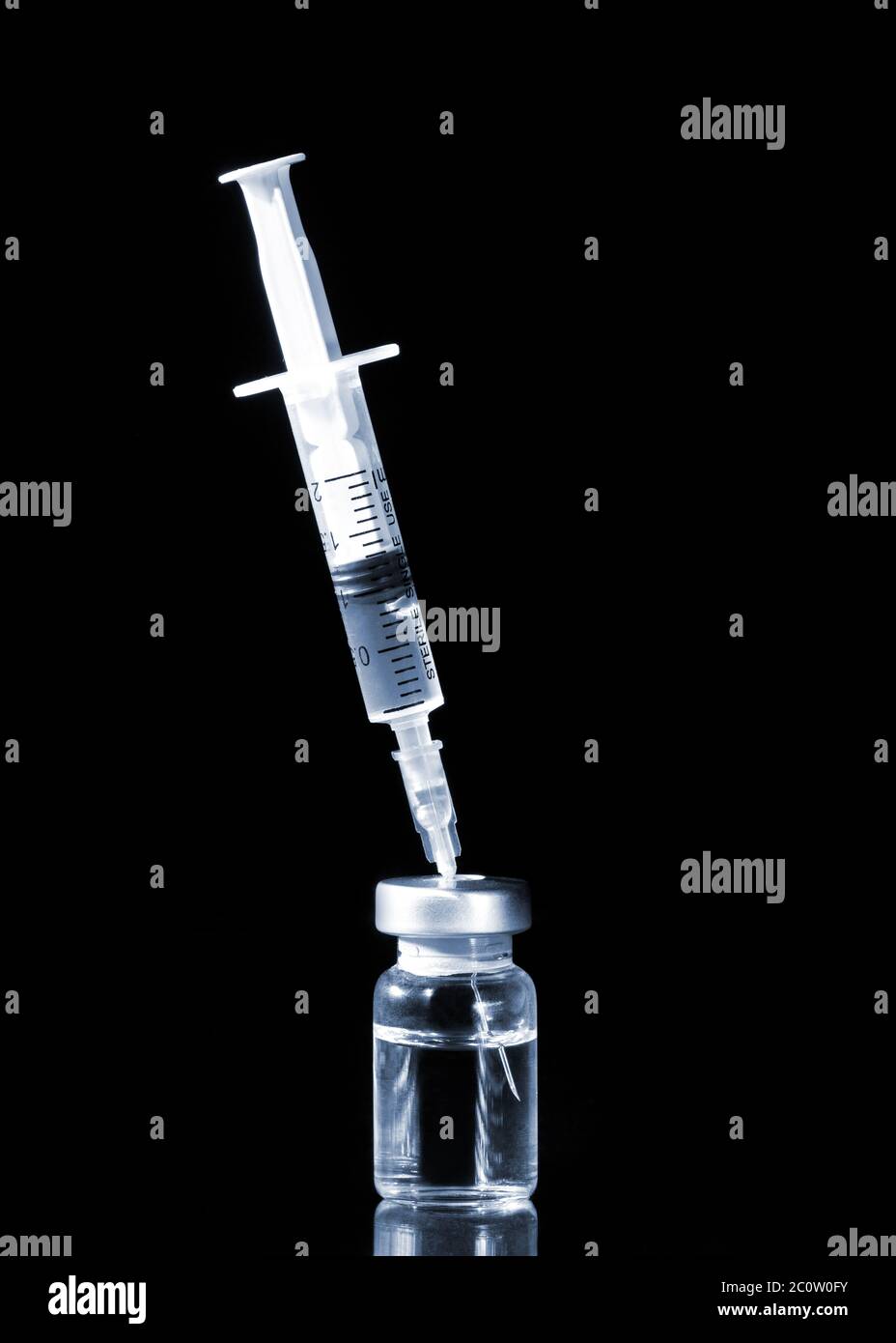 Glass Medicine Vials and Syringe Stock Photo