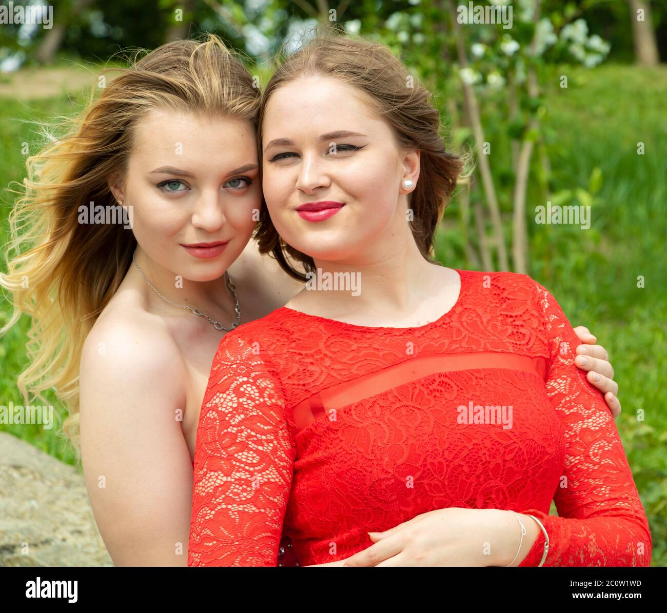 https://c8.alamy.com/comp/2C0W1WD/chisinau-moldova-june-05-2020-portrait-of-some-beautiful-girls-in-red-dresses-outside-in-park-2C0W1WD.jpg