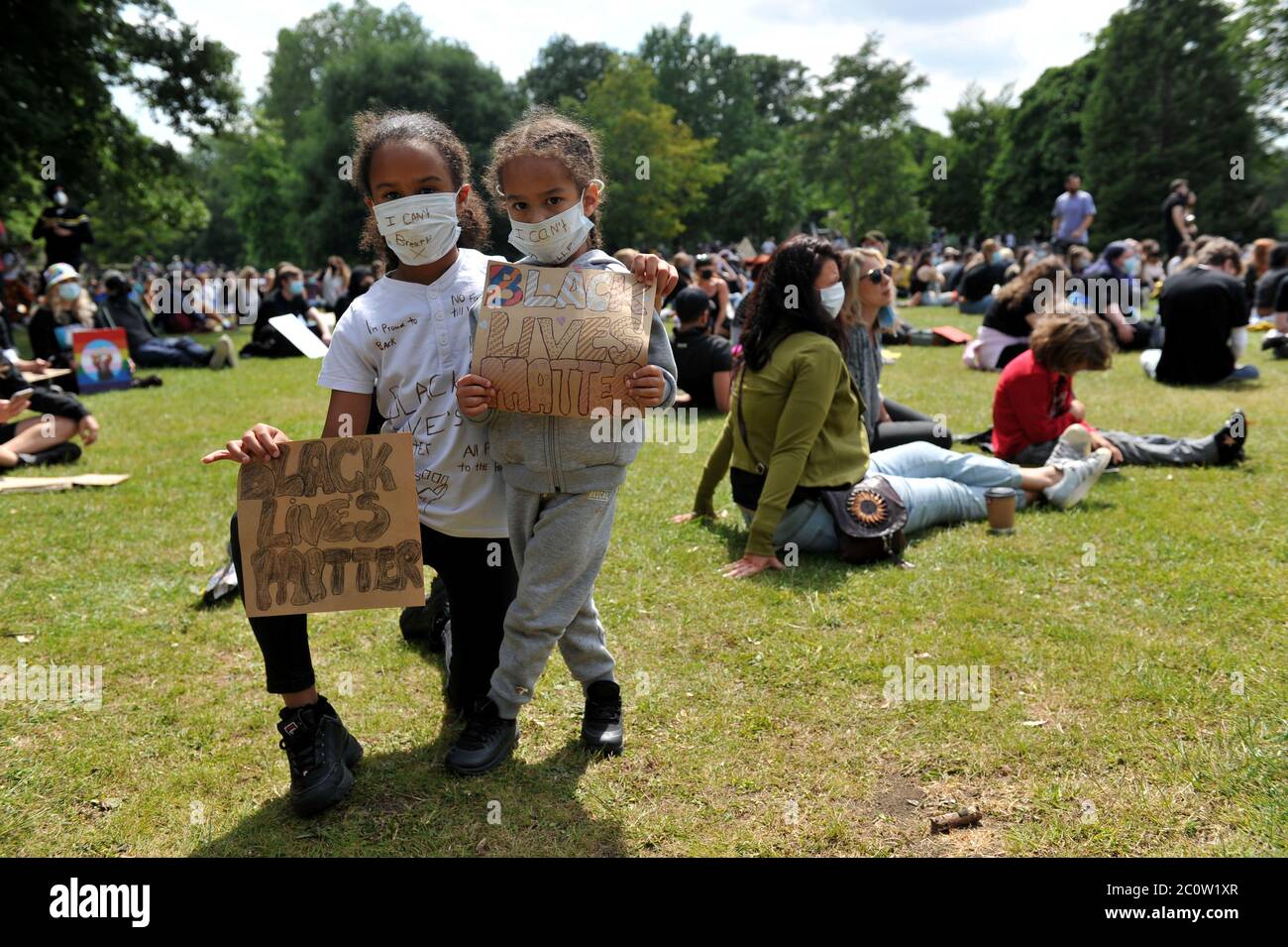 Black Lives Matter peaceful protest in Pittville Park, Cheltenham, Gloucestershire in the shadow of the iconic Regency building Pittville Pump Room. T Stock Photo