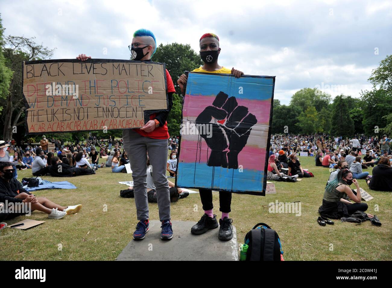 Black Lives Matter peaceful protest in Pittville Park, Cheltenham, Gloucestershire in the shadow of the iconic Regency building Pittville Pump Room. T Stock Photo