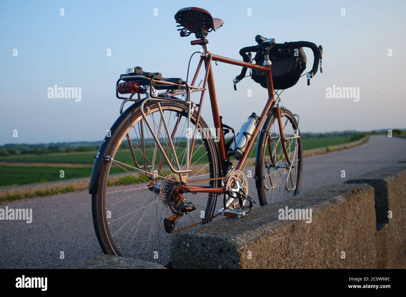 A racing bicycle on a coastal route. Stock Photo