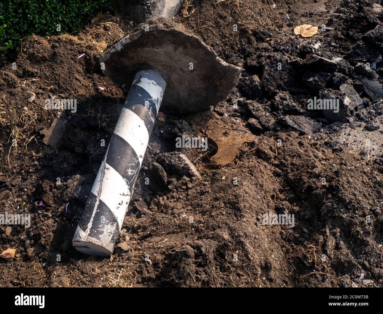 the Road repairing works with jackhammer. machine drills asphalt Stock Photo