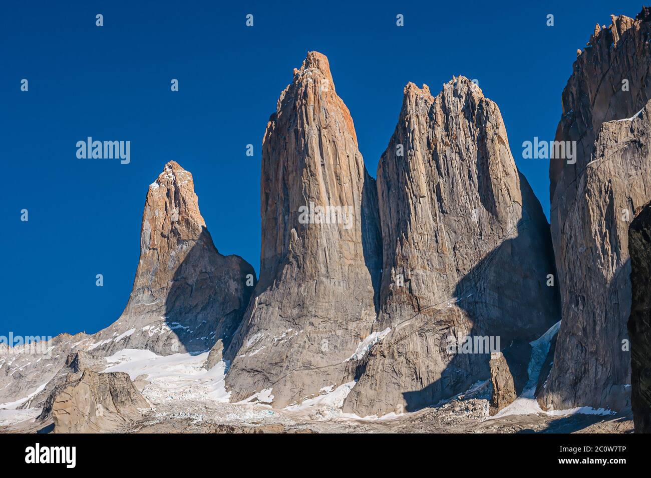 Three major peaks as summit teeth at blue sky In Torres del Paine National Park, Patagonia, Chile, sunny clear day Stock Photo