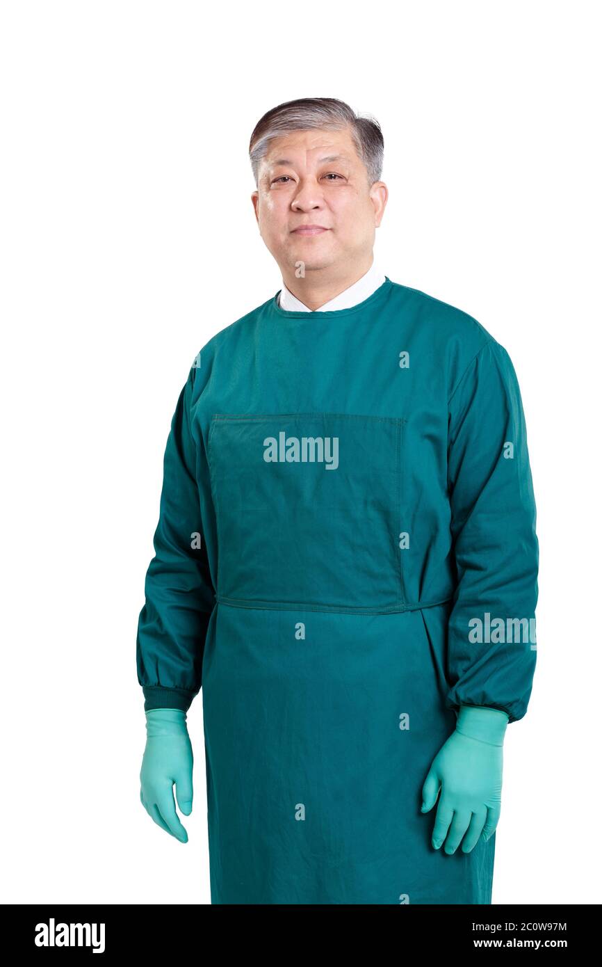 old asian man doctor in green surgical gown with gloves Stock Photo