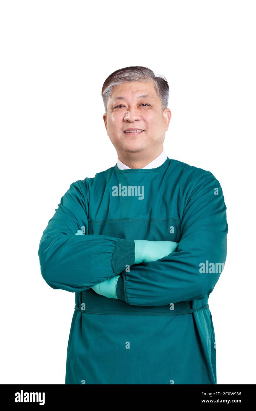 old asian man doctor in green surgical gown with gloves Stock Photo