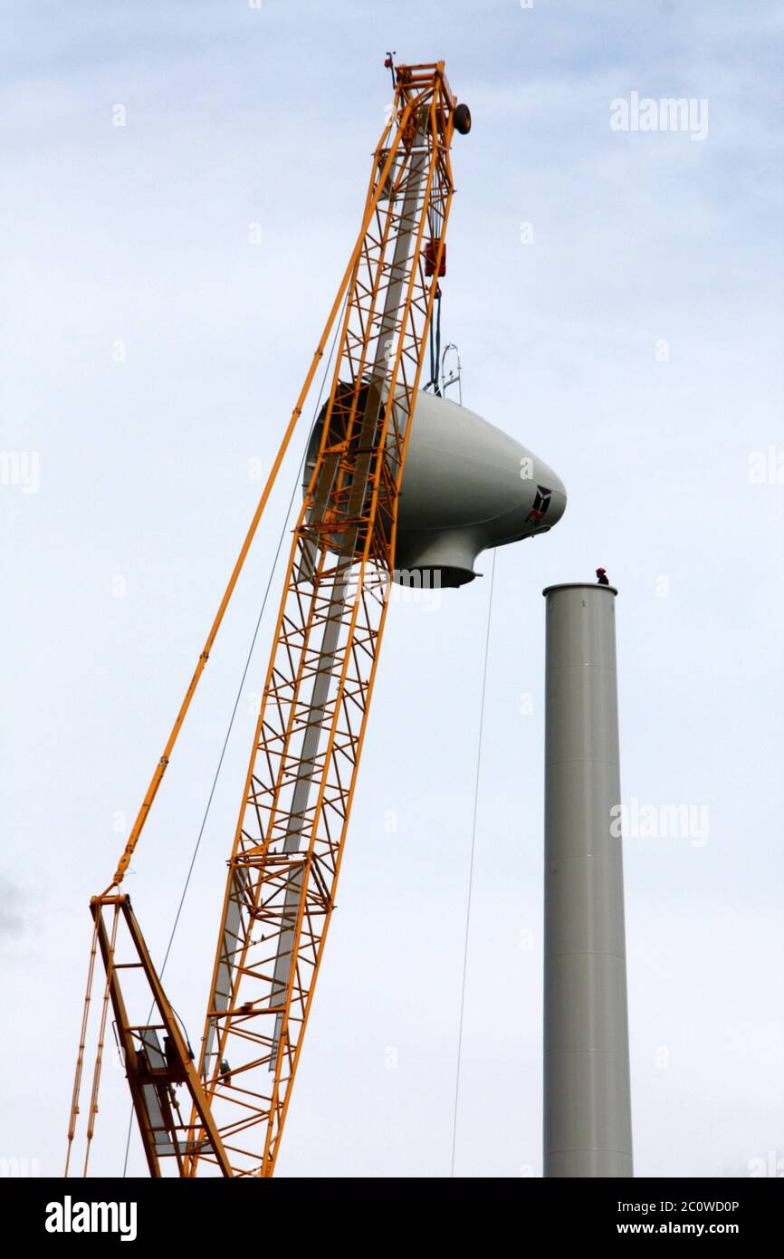 wind power station wind energy pinwheel construction site assembly wind power Stock Photo