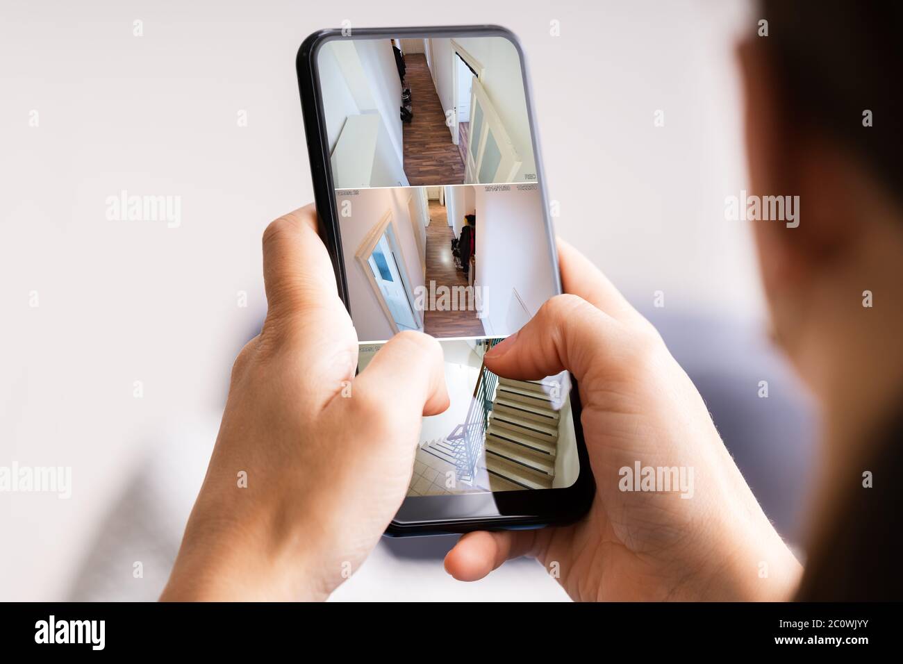 Security Camera Surveillance Video On Phone Screen Stock Photo - Alamy