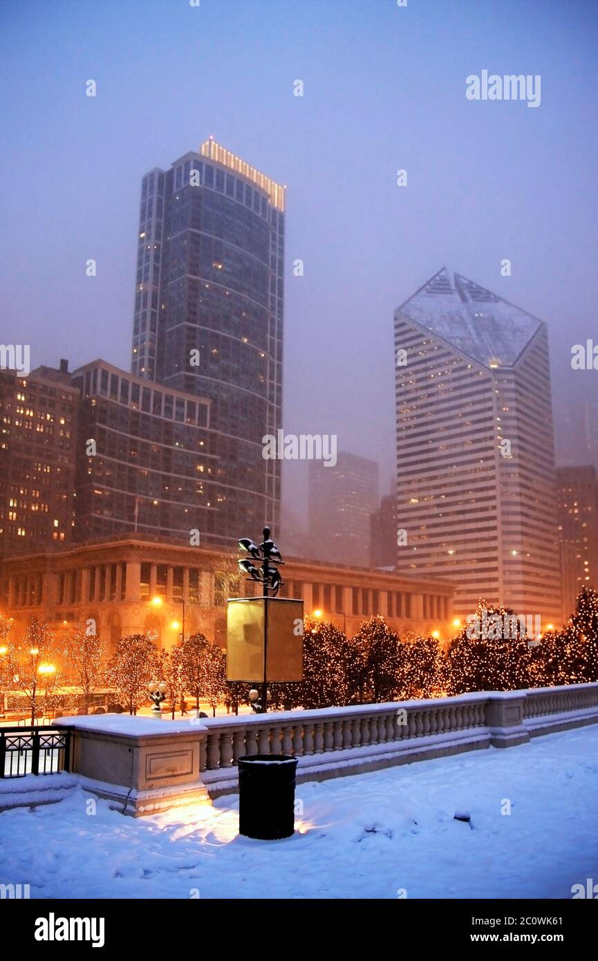 Cityscape With Snowfall And Street Lights In The Center Of Chicago