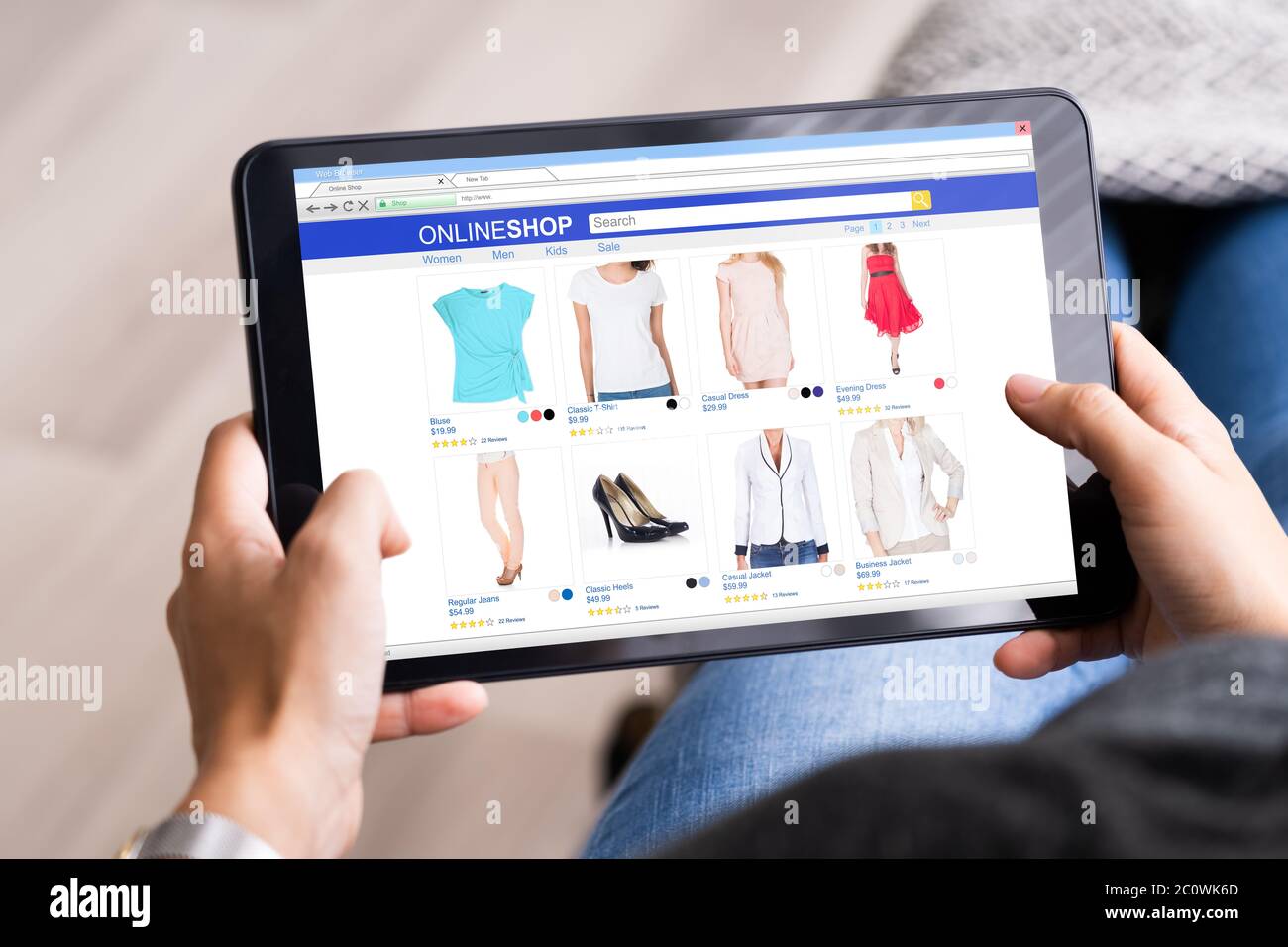 Online shopping screen clothes hi-res stock photography and images - Alamy