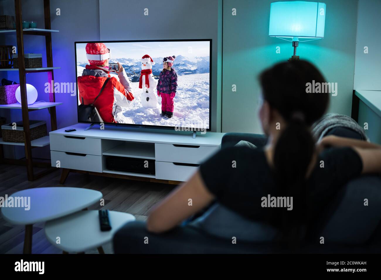 Woman Watching TV On Couch Or Sofa. Watch Television Stock Photo Alamy