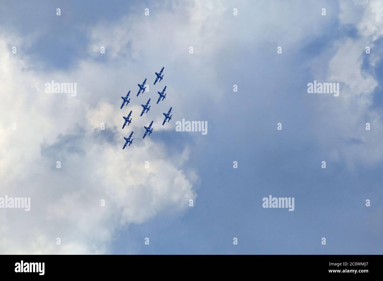 Planes on an air show against cloudy sky Stock Photo - Alamy