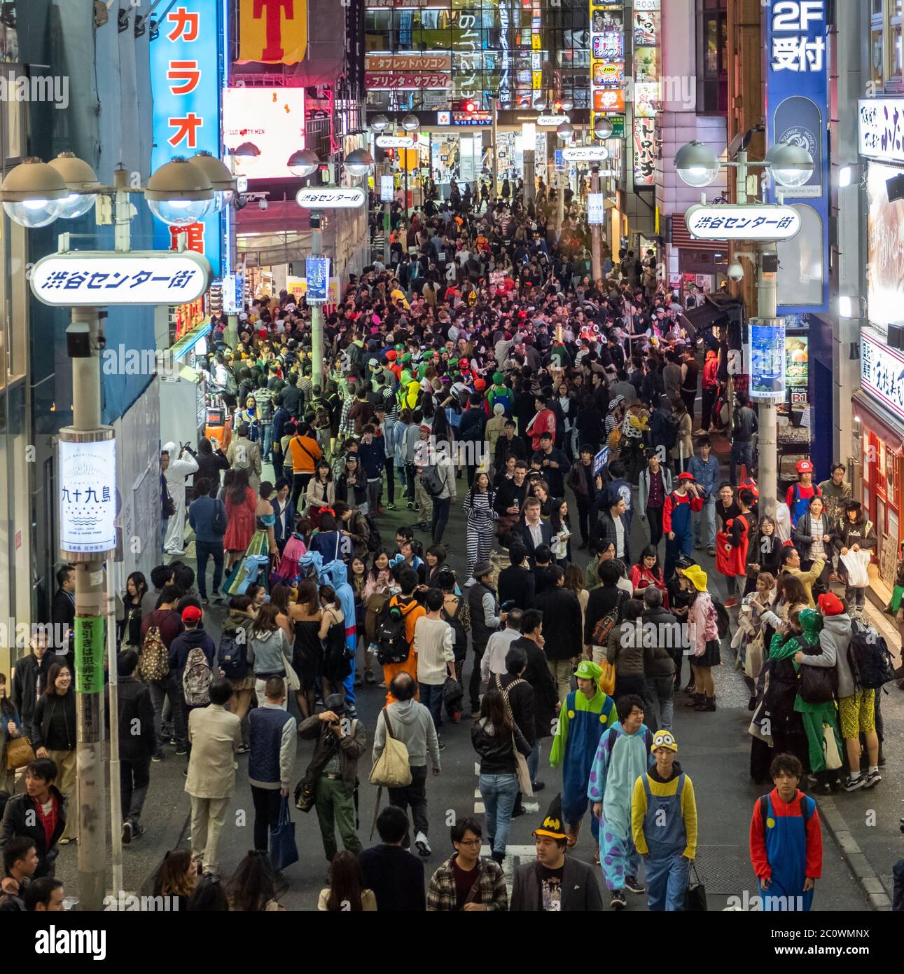 Huge crowd of people in the street of Shibuya during Halloween night