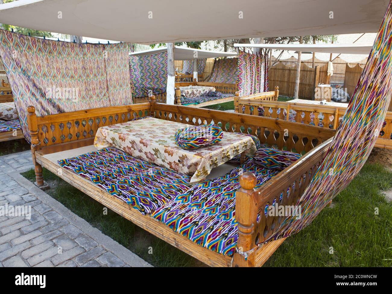 national beds for the traditional local cuisine eating. Uzbekistan. Stock Photo