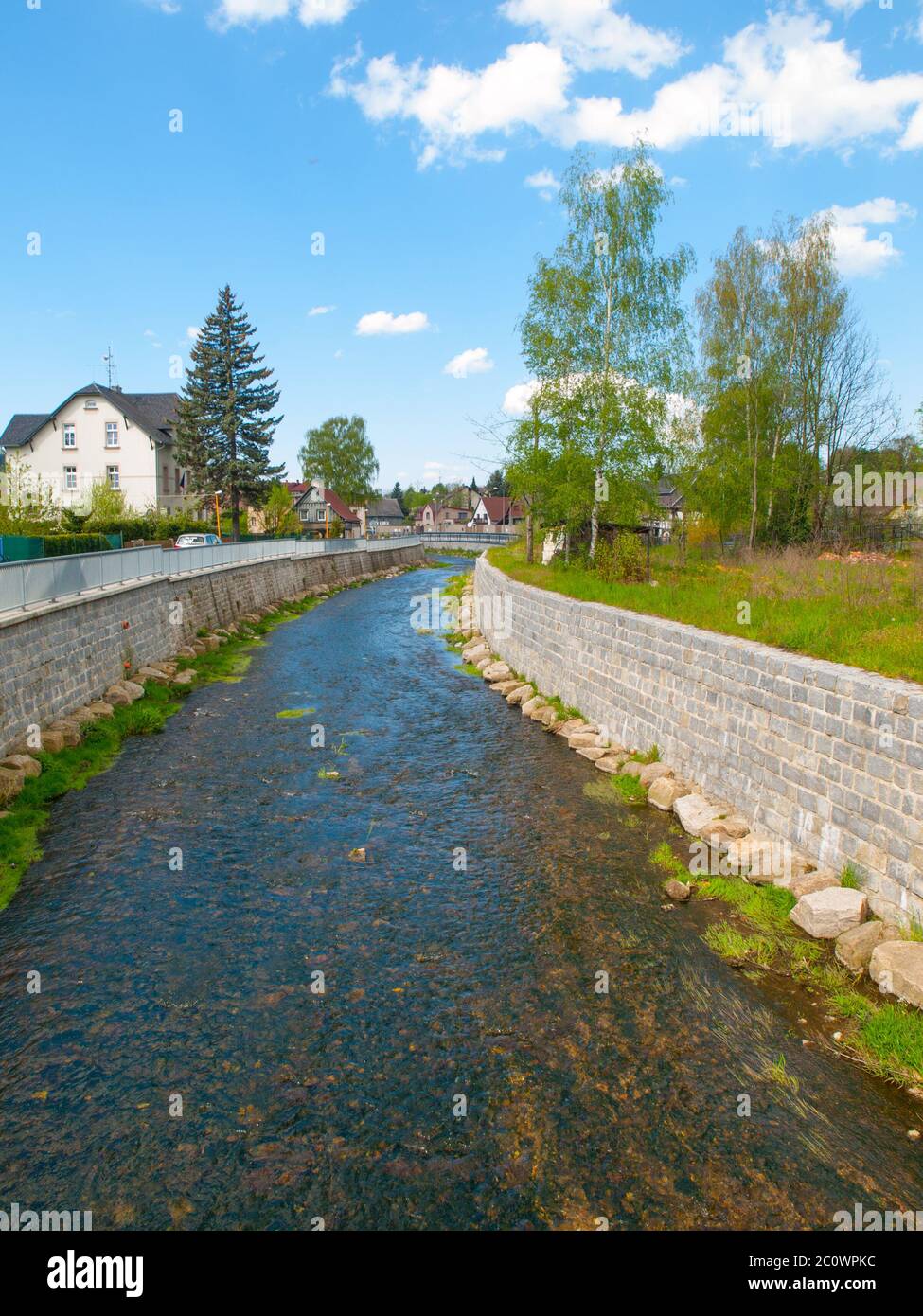 Reconstructed river bed and banks after flood. Part of small river with new rock banks reducing flood risk, Chrastava, Czech Republic Stock Photo