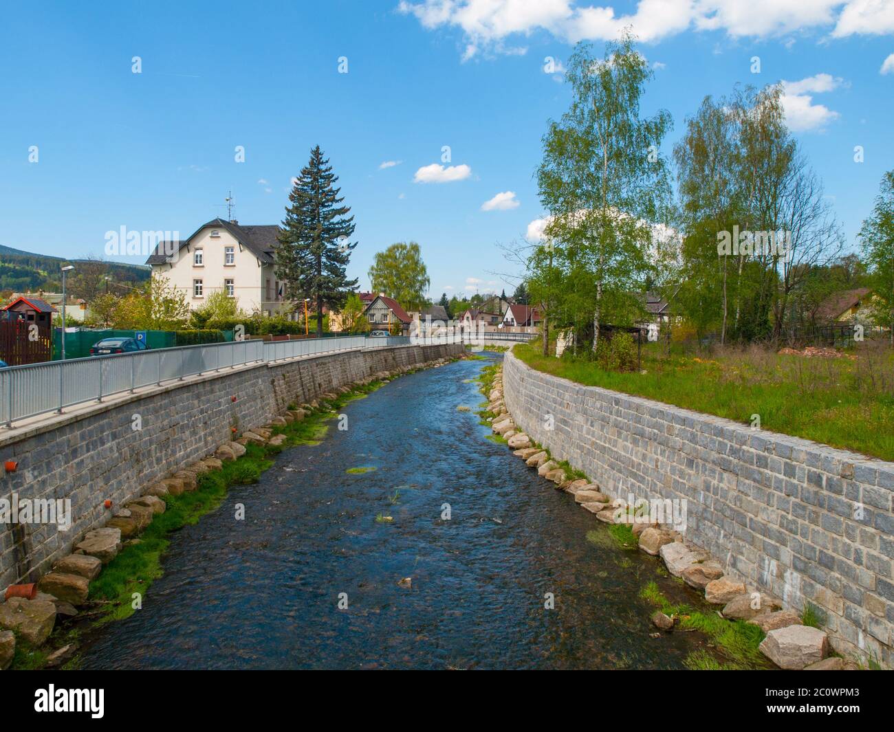 Reconstructed river bed and banks after flood. Part of small river with new rock banks reducing flood risk, Chrastava, Czech Republic Stock Photo