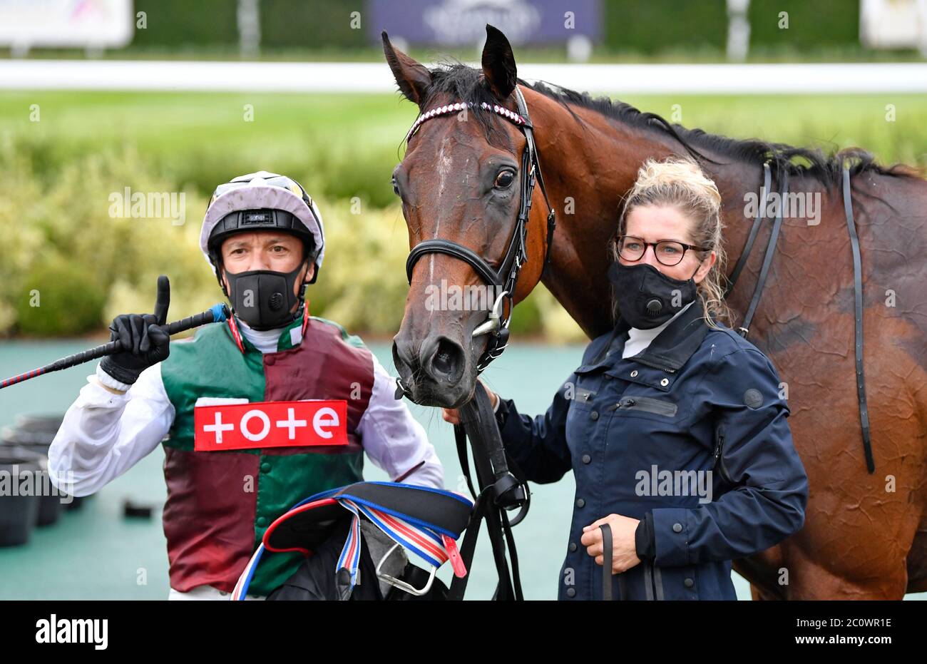 Love And Thunder and Frankie Dettori after winning the MansionBet's Royal Ascot Special EBF Fillies’ Novice Stakes at Newbury Racecourse. Stock Photo