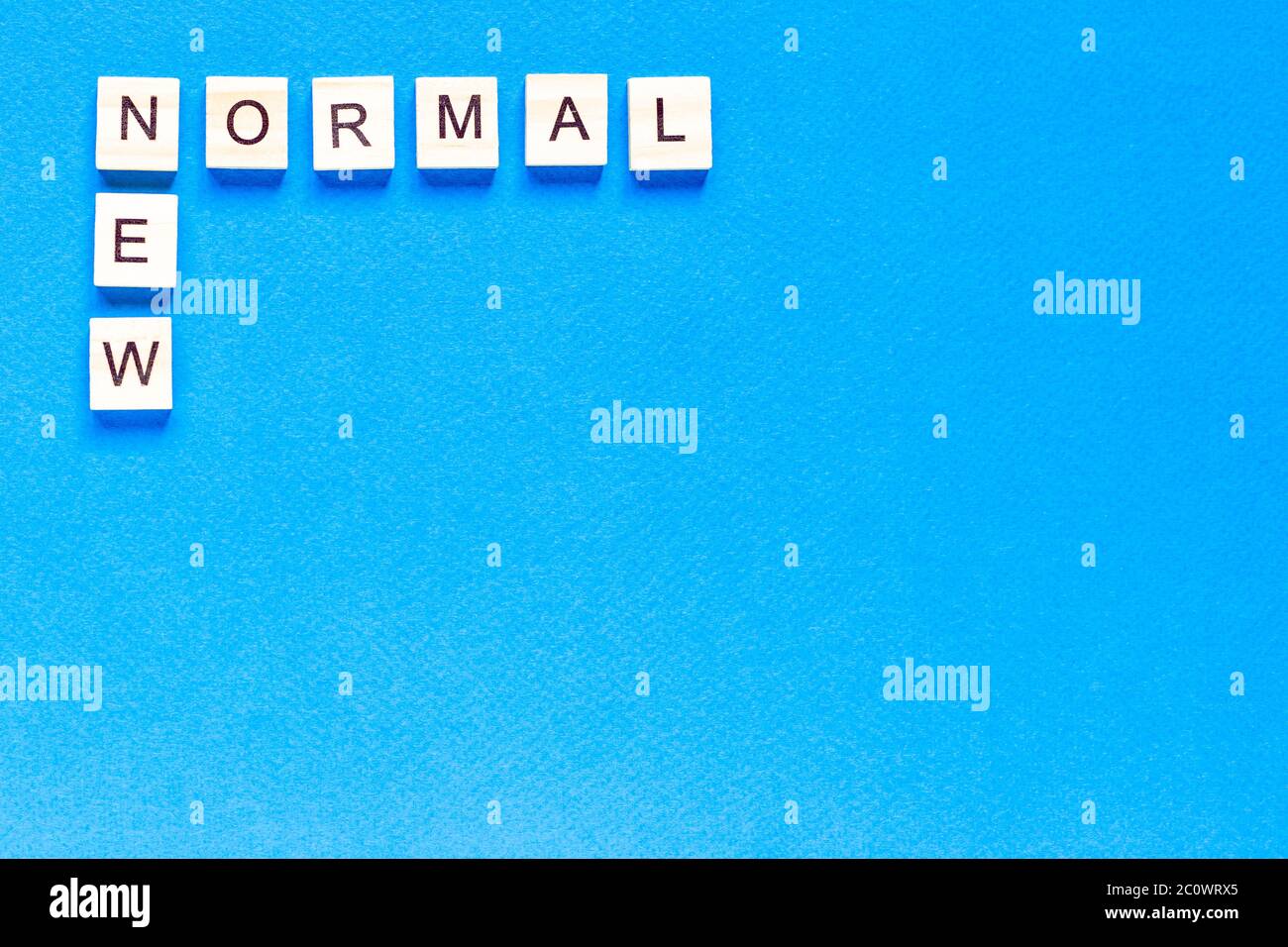 NEW NORMAL word on wooden alphabet cube. New normal concept. flat ...