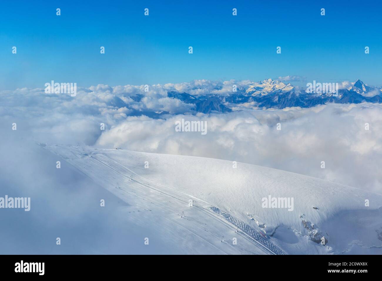 Swiss alps mountain snow aerial valley hi-res stock photography and ...