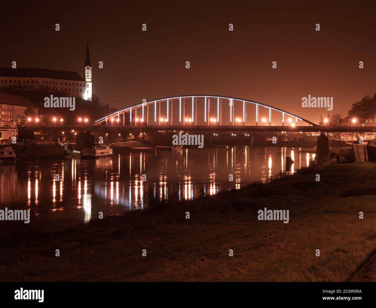 Night view of Decin Castle and Tyrs Bridge over Elbe River, Decin, Czech Republic, Europe Stock Photo