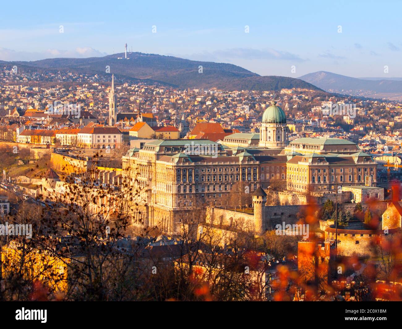 View of Buda Castle from Gellert Hill on sunny evening, Budapest, Hungary, Europe, UNESCO World Heritage Site. Stock Photo
