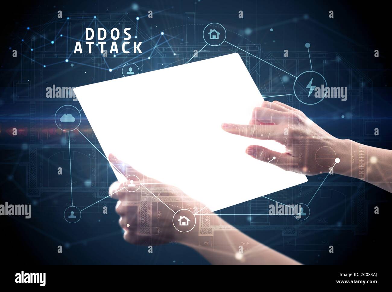 Holding futuristic tablet with DDOS ATTACK inscription, cyber security ...
