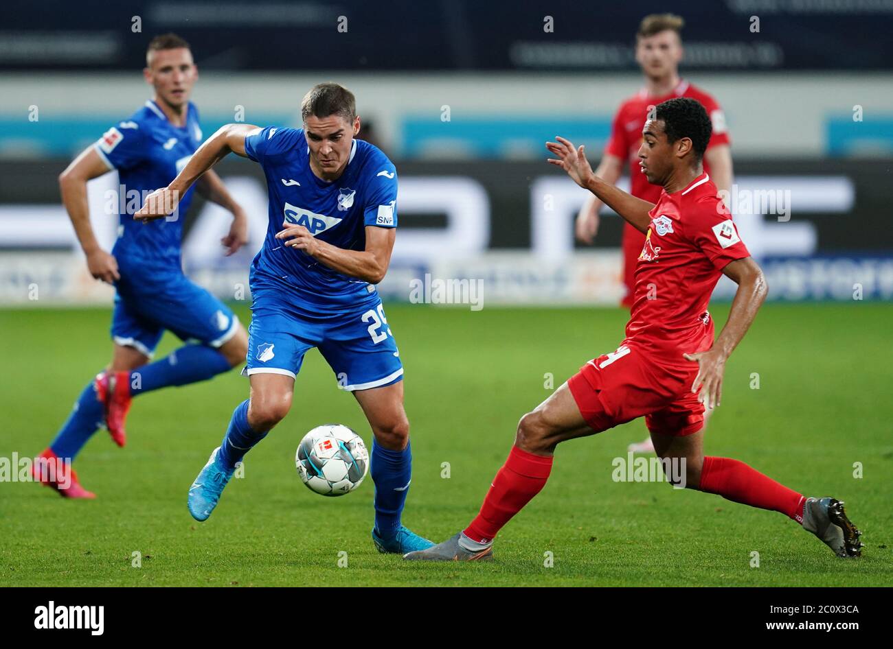 Sinsheim Germany 12th June Football Bundesliga 19 Hoffenheim Rb Leipzig 31st Day Of Play In The Prezero Arena Hoffenheim S Robert Skov L Fights For The Ball With Leipzig S Tyler Adams Sinsheim Germany 12th June Football Bundesliga 19 Hoffenheim Rb Leipzig 31st Day Of Play In The Prezero Arena Hoffenheim S Robert Skov L Fights For The Ball With Leipzig S Tyler Adams