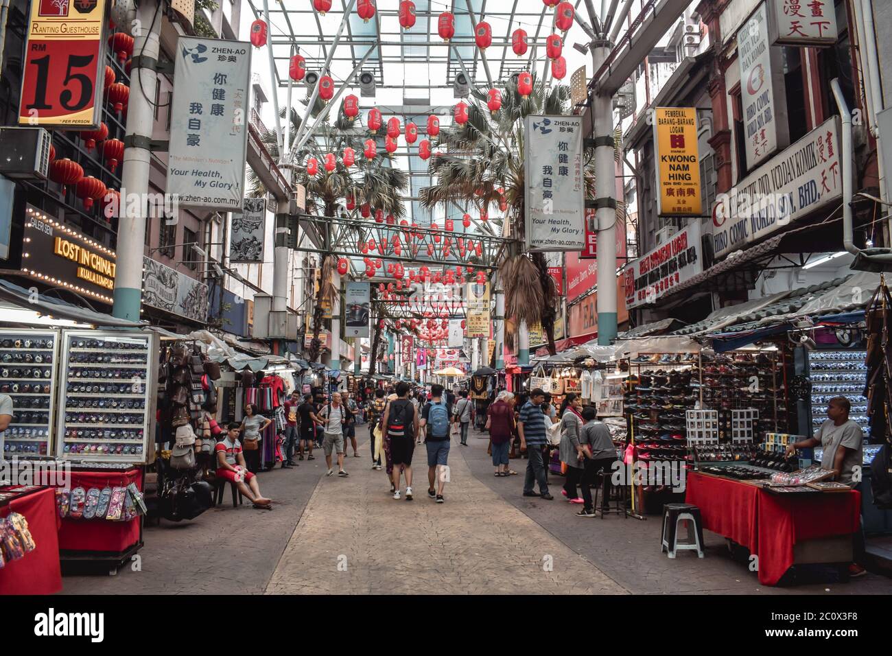 People walking on a Street Market in Petaling street in Chinese town in Kuala Lumpur Malaysia Stock Photo