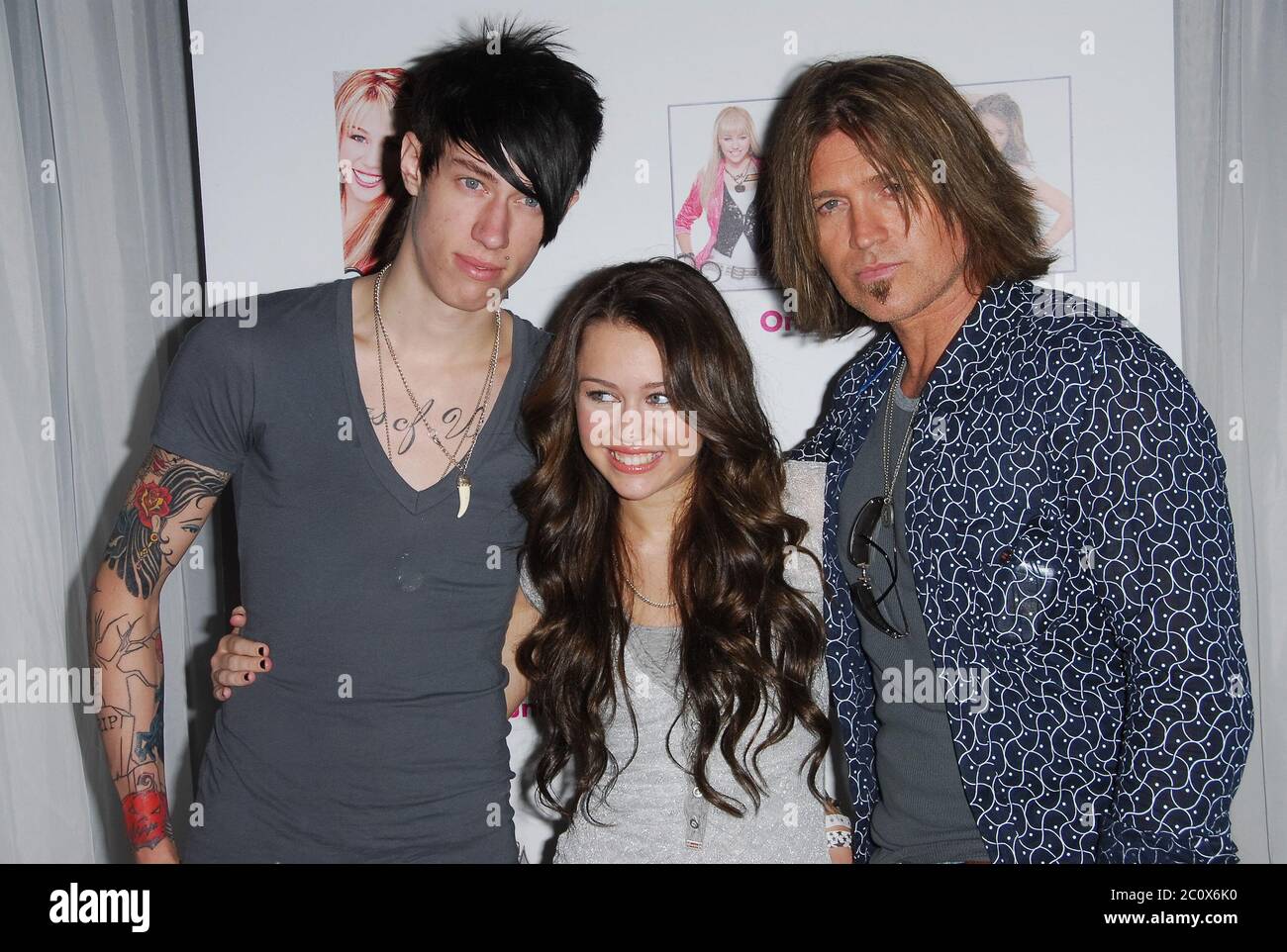 Trace Cyrus, Miley Cyrus and Billy Ray Cyrus at the Disney Channel