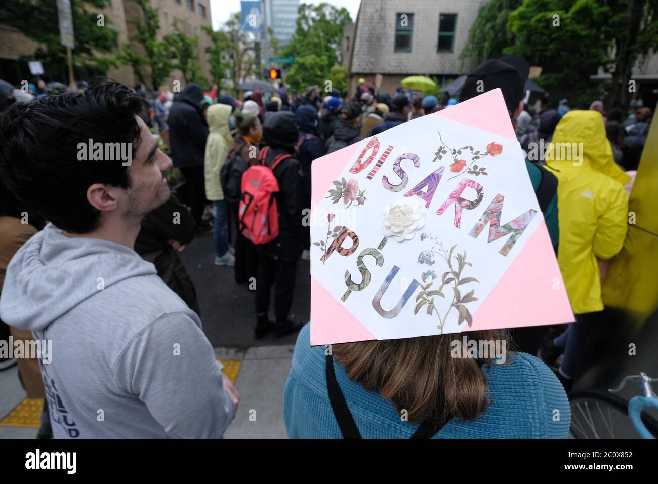 Portland, USA. 12th June, 2020. Disarm Portland State University protesters demonstrate outside the Campus Public Safety Office (CPSO) in Portland, Ore., on June 12, 2020, as people hold signs in remembrance of Jason Washington who was killed by campus police in June 2018. (Photo by Alex Milan Tracy/Sipa USA) Credit: Sipa USA/Alamy Live News Stock Photo