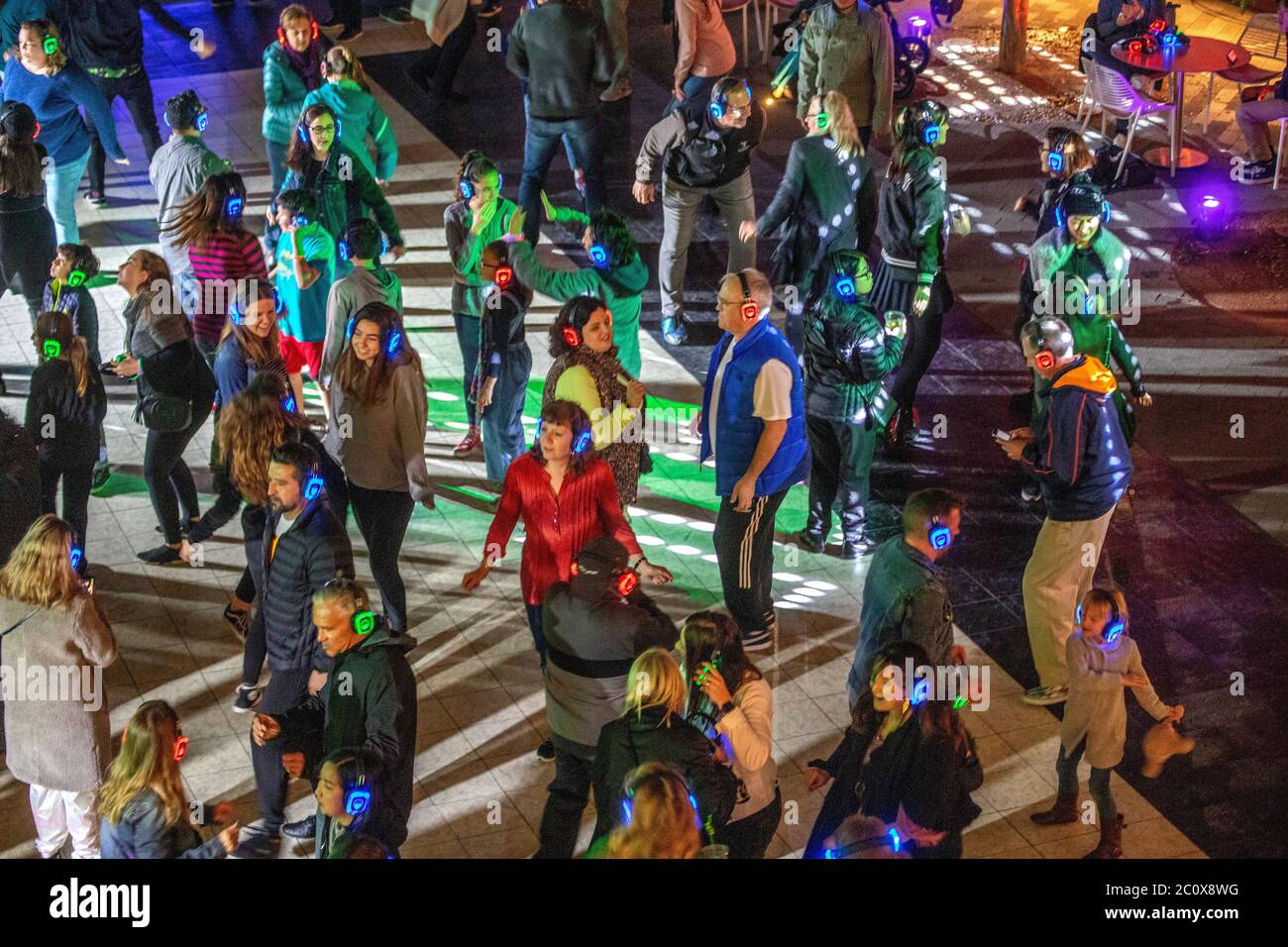 Using wireless headphones, dancers have three choices of music, each