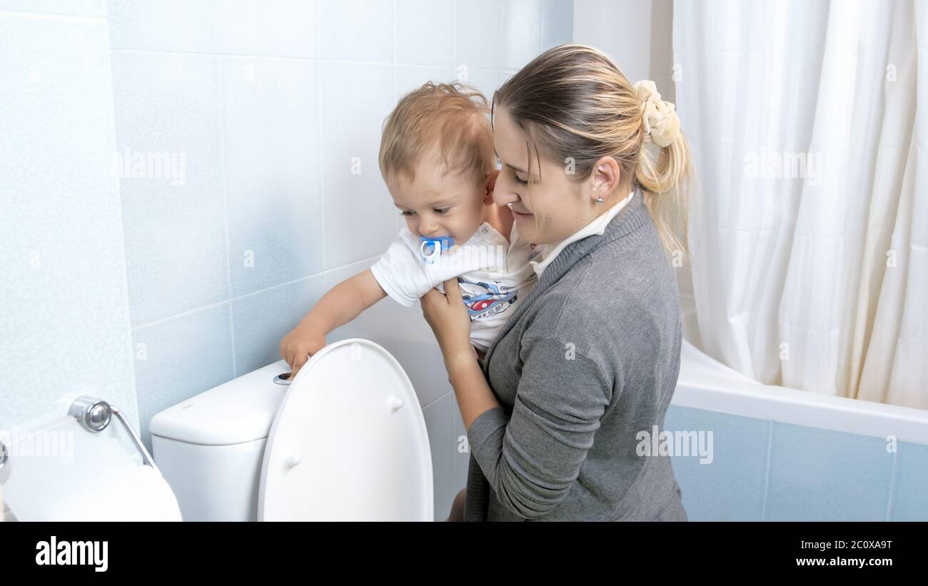 Flushing toilet child hires stock photography and images Alamy