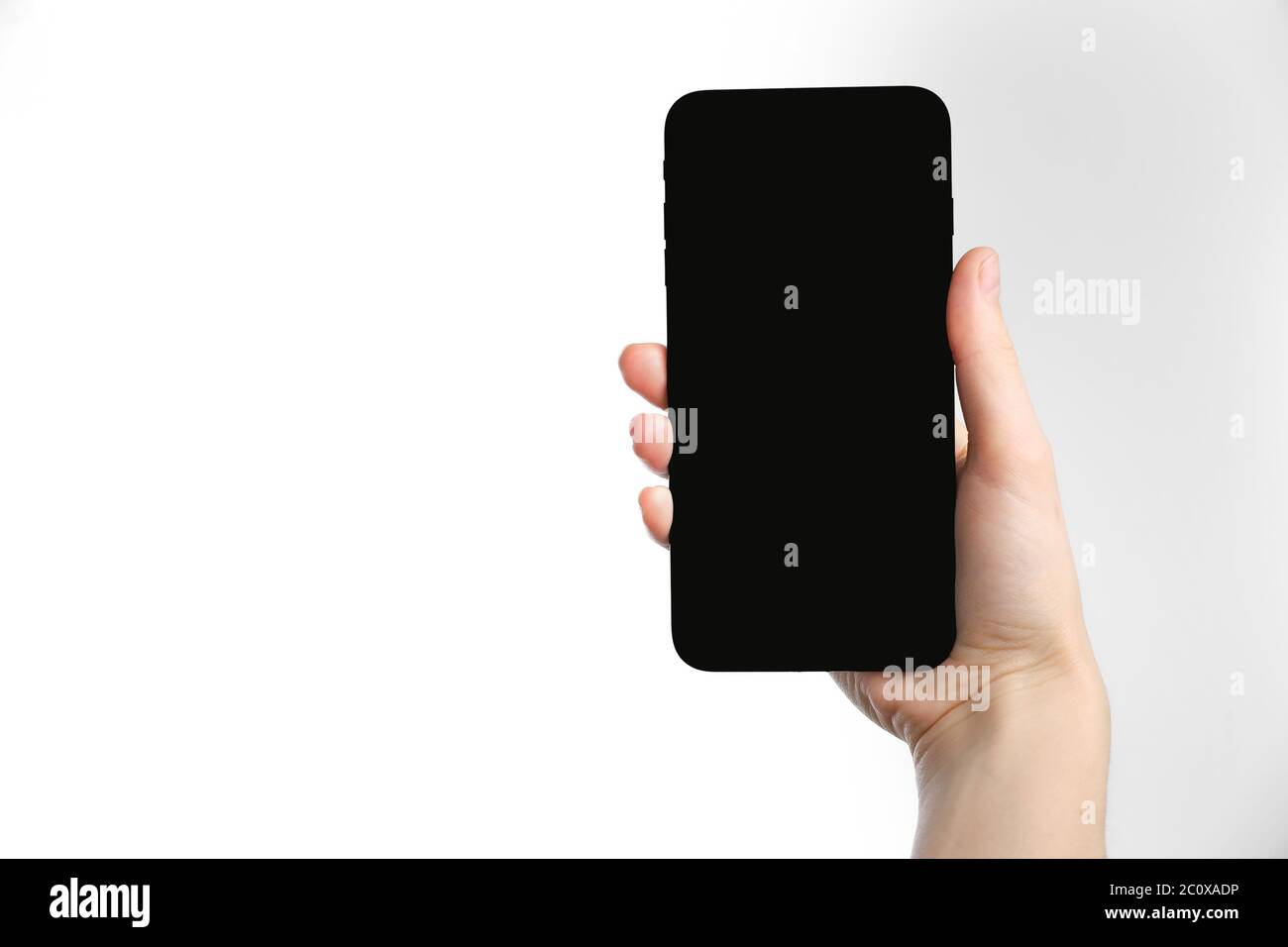 hand holding smartphone isolated on white background - clipping paths ...